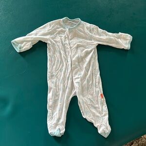 Super soft and magnet onesie.